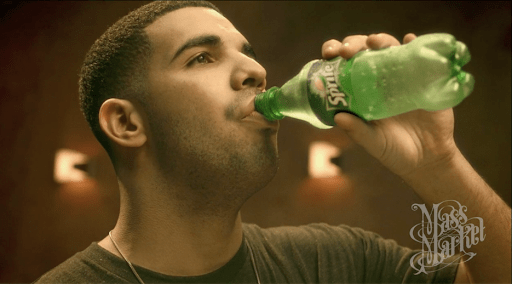 Rapper Drake drinks a Sprite in fallacious ad. 