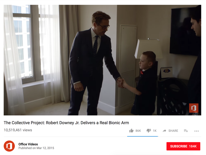 screenshot of video of Robert Downey Jr. with young child